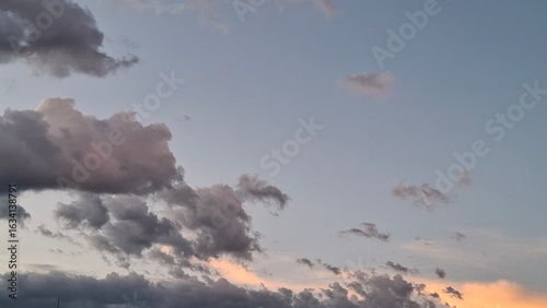 evening time, dark clouds in the sky illuminated by the sun, sunset, summer season