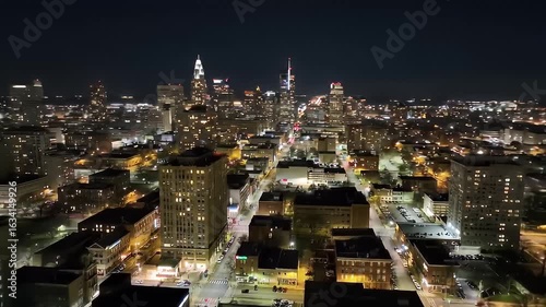 Wallpaper Mural Cityscape view at night, streetlights and building windows illuminated in the darkness Torontodigital.ca