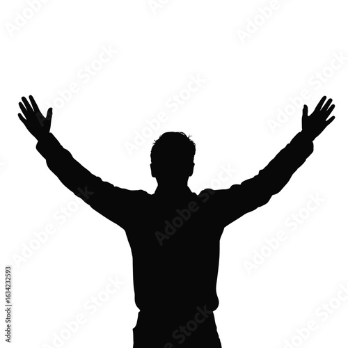 Silhouette of a man with arms raised in celebration