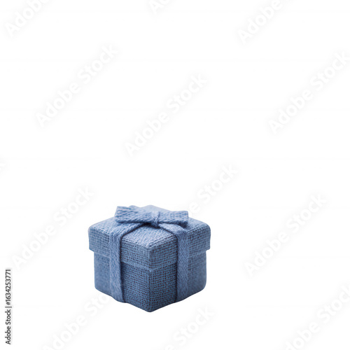 Blue gift box with a ribbon, perfect for celebrations and special occasions, showcasing elegance and thoughtfulness.