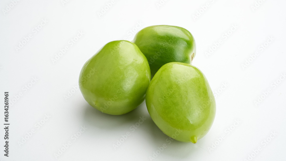 Fresh green tomatoes isolated on white background
Fresh green tomatoes isolated on white background