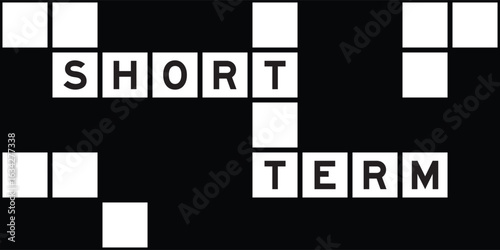 Alphabet letter in word short term on crossword puzzle background