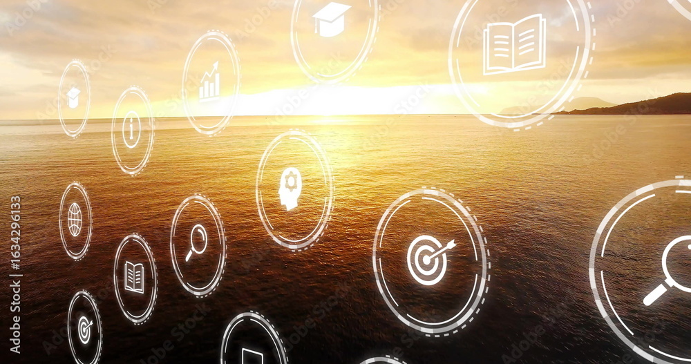 Obraz premium Pływające ikony cyfrowe reprezentujące cele edukacyjne w zakresie czytania, unoszące się nad sylwetką wyspy o zachodzie słońca