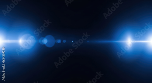 Blue flare light effect on dark background for abstract technological concepts