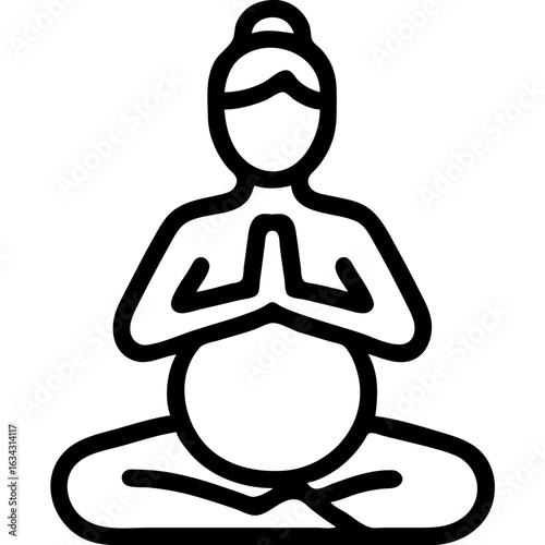 A woman is sitting cross legged and meditating. She is pregnant and has a baby bump