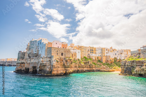 Fototapeta Naklejka Na Ścianę i Meble -  View of Polignano a Mare beach in Italy. Top tourist destinations in Italy. Trip to Europe.