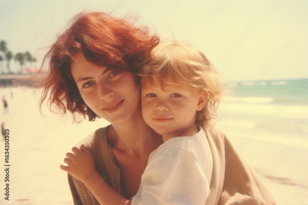 American mom piggyback baby on a beach photography portrait outdoors. American mom piggyback baby on a beach photography portrait outdoors.