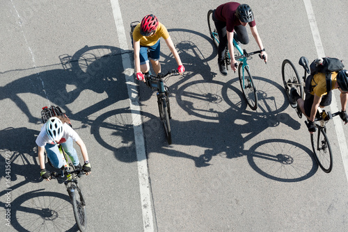People cycling in the city, top view