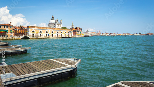 View of the Venetian Laguna, seen from the Giudecca Island; in the background, the Basilica of the Most Holy Redeemer. Worldwide famous, Venezia is a unique kind of city and UNESCO site.