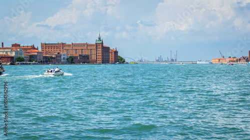 View of the Venetian Laguna, seen from the Giudecca Island; in the background the luxury Hilton Hotel. Worldwide famous, Venezia is a unique kind of city and UNESCO site.