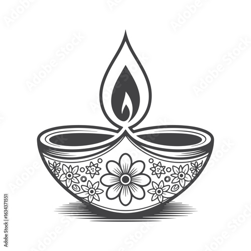 Ornate oil lamp with floral motifs and flame diwali lamp diya