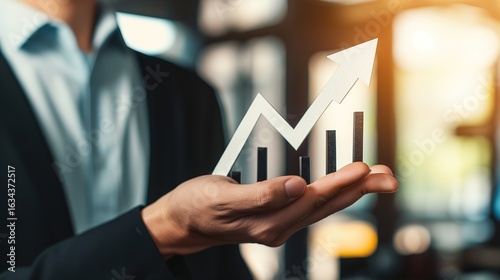 Profit Growth Strategy: Businessman with Upward Trend Graph