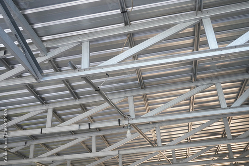 Modern industrial steel structure showing complex geometric ceiling design and construction elements