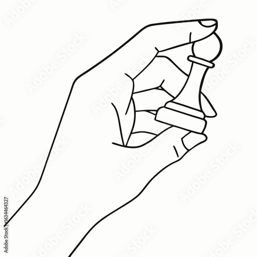 Hand holding chess pawn piece for strategic board game with copy space; game strategy