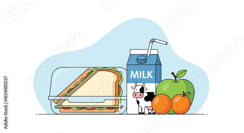 Wholesome picnic lunch featuring a delicious sandwich fresh fruit and a carton of milk
