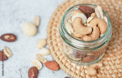 Top view of Healthy mix nuts in a bowl. Almonds, hazelnuts, cashews, peanuts and pistachios. 