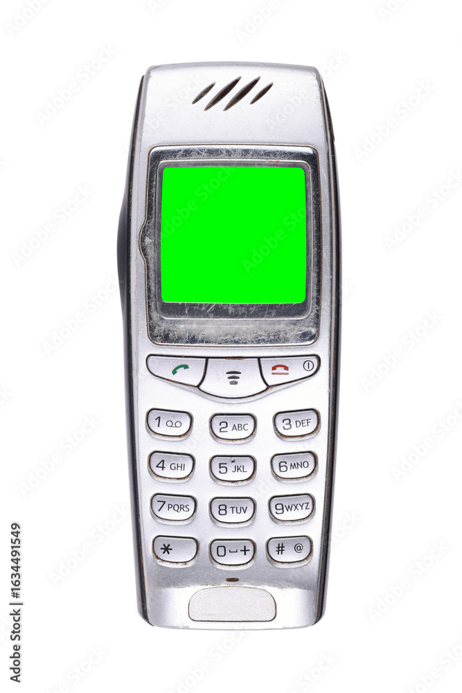 Classic mobile phone from the early 2000s with green screen isolated on white background. Classic mobile phone from the early 2000s with green screen isolated on white background.