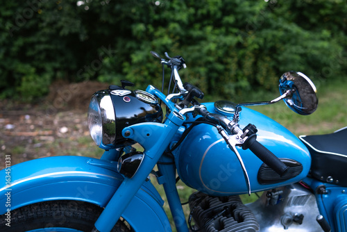 Old blue motorcycle from the 60s