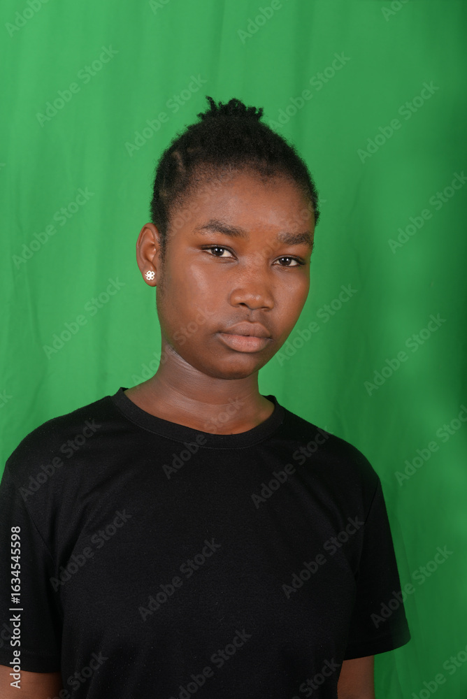 Fototapeta premium portrait of a young teenage girl with an innocent look.