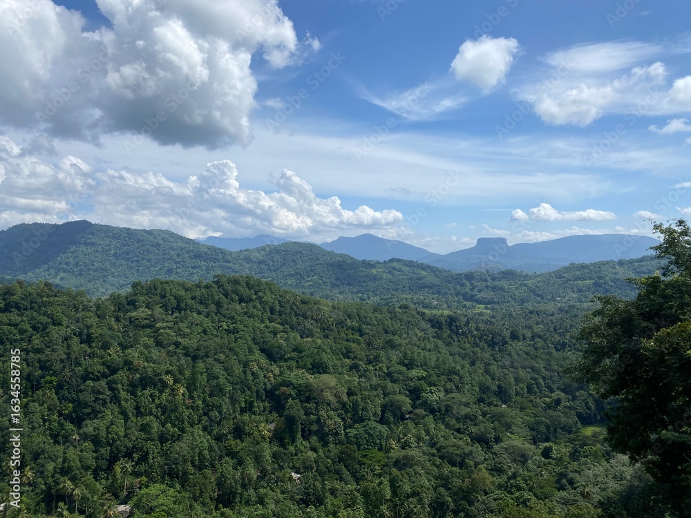 Naklejka premium clouds over the mountains