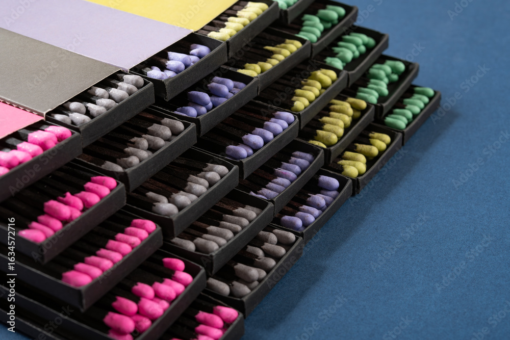 Naklejka premium angle view multi color matchboxes