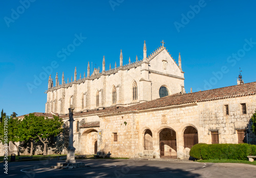 The Isabelline Gothic Monastery of Cartuja de Miraflores in Burgos, Spain, on a sunny day.