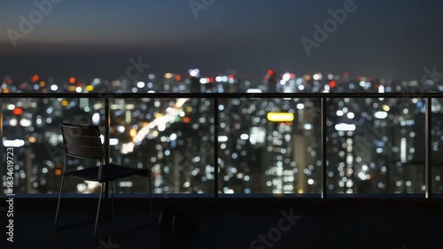 Wallpaper Mural Night cityscape viewed from a high-rise balcony, a single chair sits empty overlooking the city lights. Torontodigital.ca