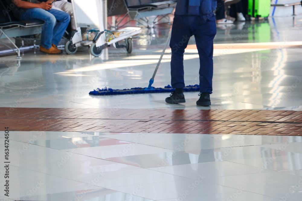Obraz premium The floor mop fabric used by the airport cleaners