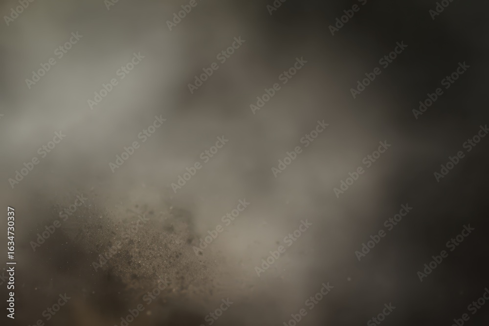 Obraz premium Blurry browngray background showing unclear surface with hints of texture and color variations in dim light