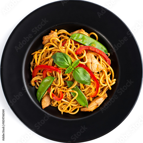 Delicious Chicken Chow Mein with Colorful Vegetables on Black Plate Perfect for Asian Food Lovers and Culinary Enthusiasts