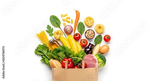 Abundance of colorful fresh ingredients spilling out of a paper grocery bag on white background