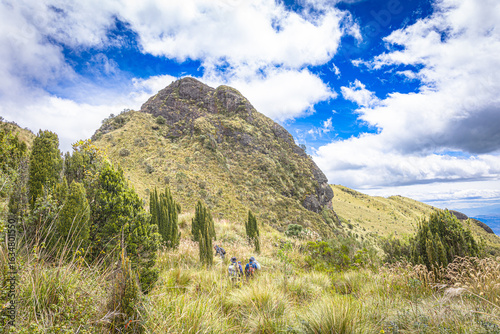 Pichincha Province, Quito, Ecuador - July 5, 2025: Hikers climb to the summit of Pasochoa Volcano, in the Pasochoa Wildlife Refuge. It is an extinct volcano, 4,200 meters high.
