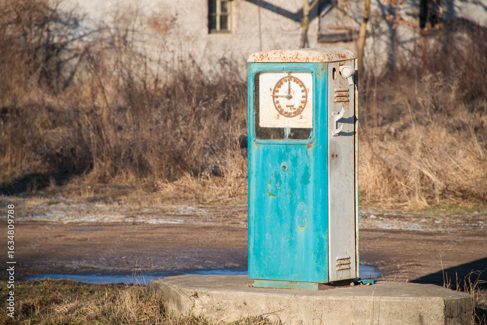 Fototapeta premium old car gas station. Abandoned gas station. ghost town