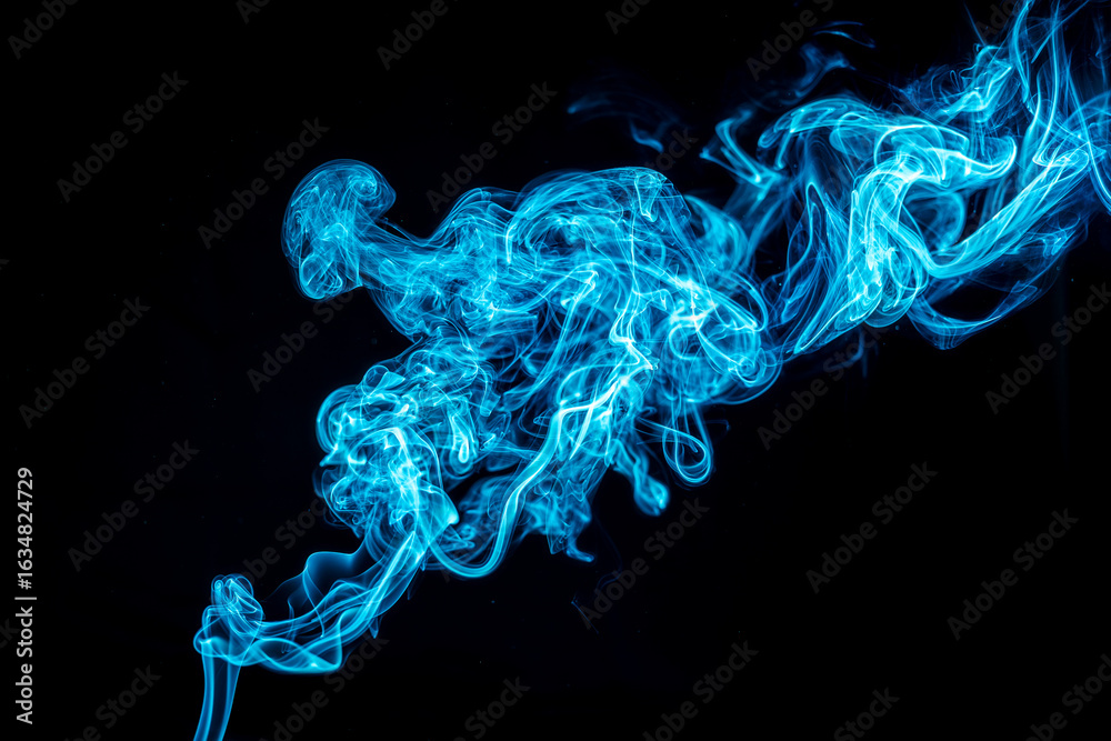 Fototapeta premium Abstract Blue Smoke on Black Background 