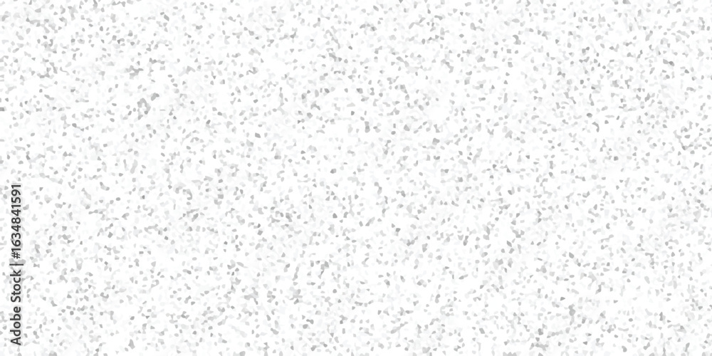 Abstract textured background with a random mosaic of small geometric shapes in varying shades of gray