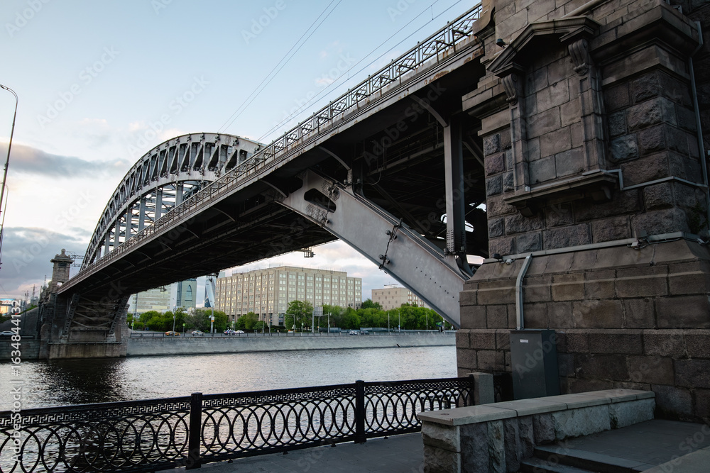 Fototapeta premium Urban landscape with a railway bridge over a river. Berezhkovsky Bridge in Moscow