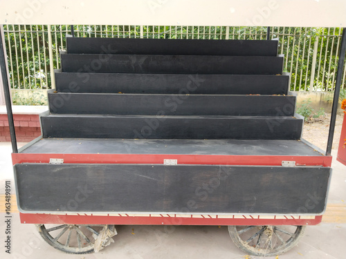 indian style cart street food near street. New cart with racks