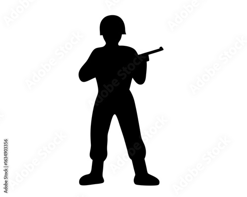 Silhouette of a soldier standing with a rifle in a combat stance