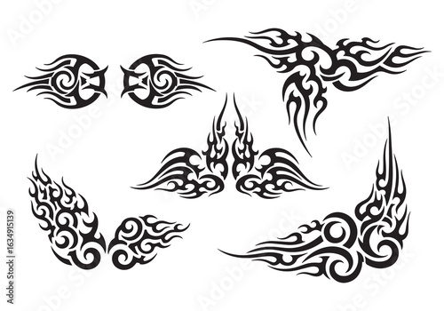 Collection of Black Tribal Flame Tattoo Designs on White Background