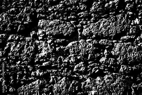 Abstract black and white rough texture background showcasing rugged rock formations and contrasting light and shadow patterns ideal for graphic design