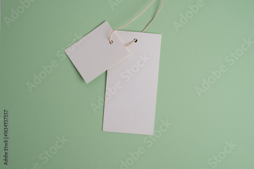 Mockup of clothing tag on color background. clothing brand concept
