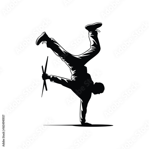 Silhouette of a breakdancer performing a handstand with a drone