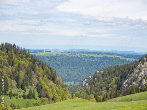 Chasseral, Switzerland - May 26th 2024: Beautiful Jura landscape with Mt. Crosin and its wind engines.