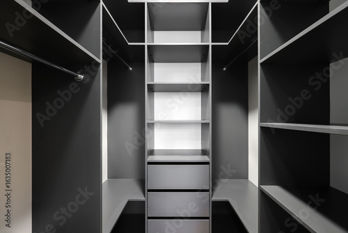 Wardrobe with shelves in the dressing room