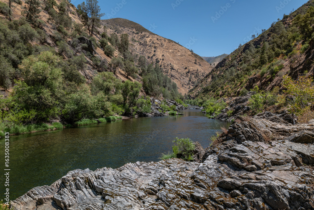 Fototapeta premium Phyllite and chert of Hite Cove (Triassic). California State Route 140, Midpines, Mariposa County. Metamorphic rock. Sierra Nevada. Merced River.