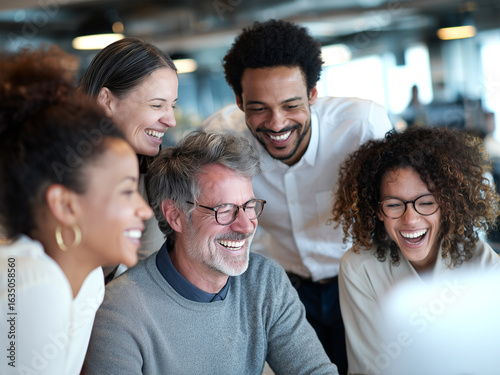 A multicultural team collaborating in a modern office, happy expressions, different ethnicities and body types, natural light, candid and inclusive business scene Diverse group of coworkers laughing 