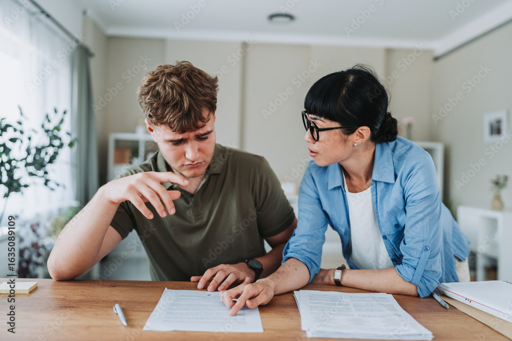 Obraz premium japanese teacher explain lesson to stressed young man student at home