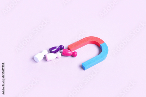 Magnet attracting group of ...