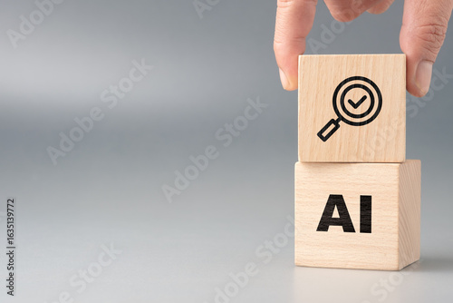 Schilderij op canvas Wooden blocks with AI and magnifying glass icon representing the use of artifici