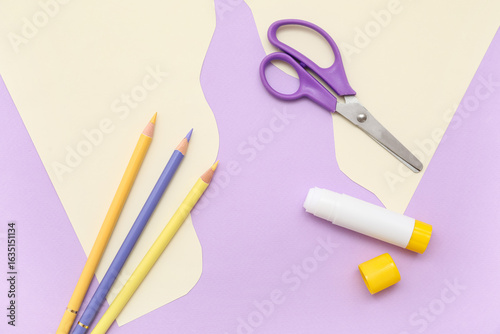 Stick of glue, scissors, pe...